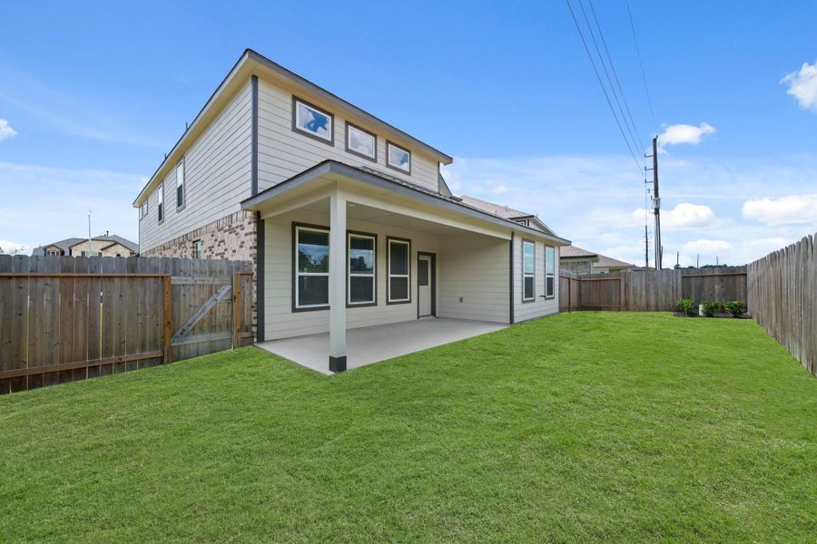 Front exterior of a new home in Grand Oaks – The Cove, Houston, TX, highlighting curb appeal (Image 15).