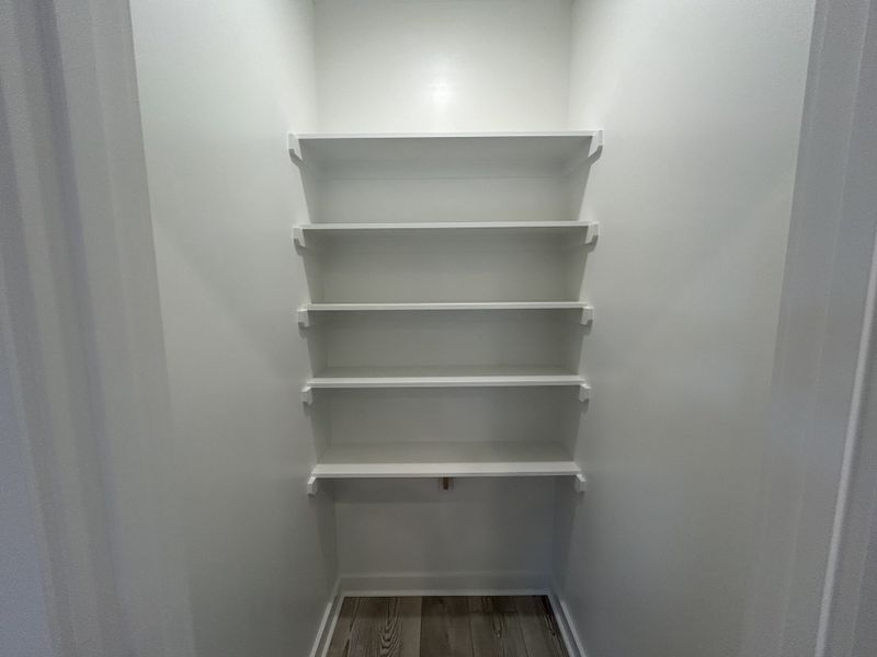 Spacious, unfurnished interior of a new home in Hickory Cove, Burns (Image 12).