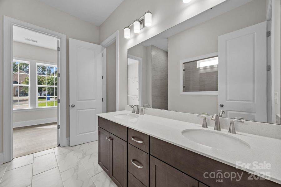 Primary Bathroom and walk in closet Primary Bathroom and walk in closet