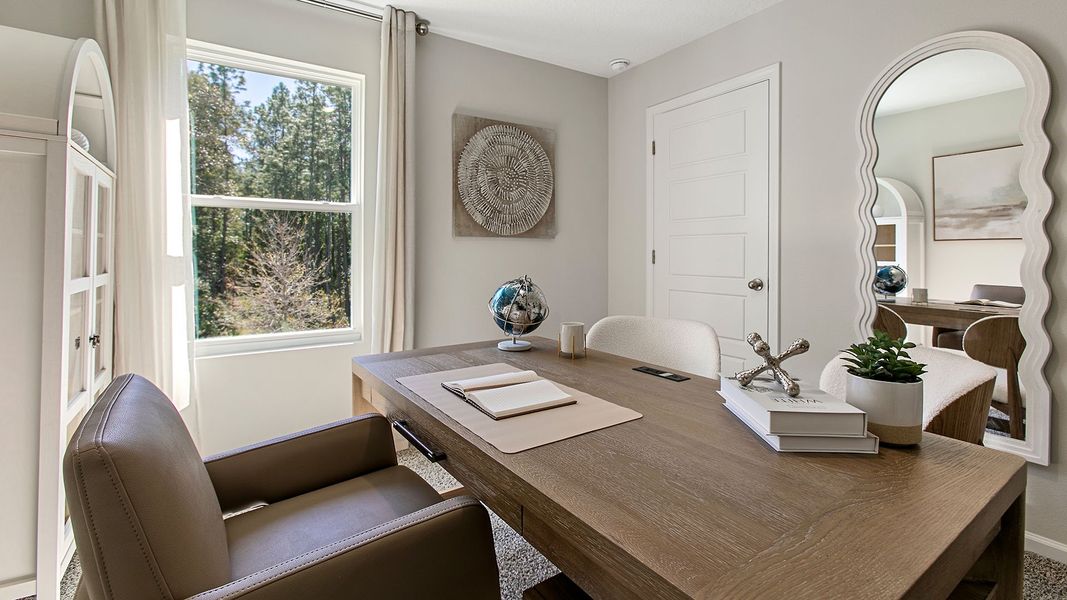 Representative furnished interior of a home built from the HAYDEN II by D.R. Horton in Copes Landing, Jacksonville (Image 24).
