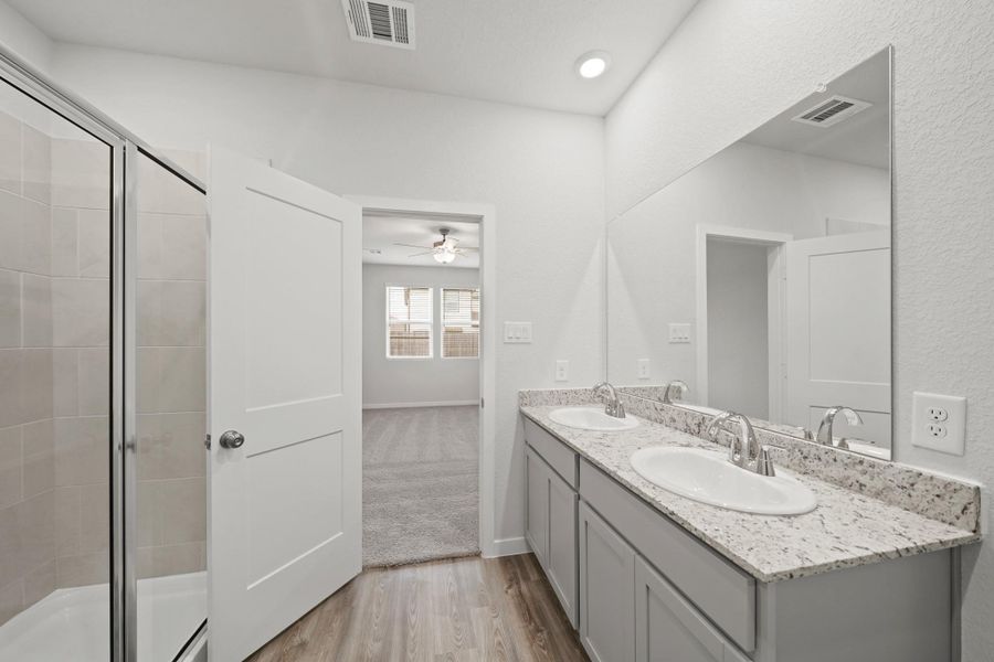 Furnished interior view inside a new home in Granger Pines, Conroe (Image 10).