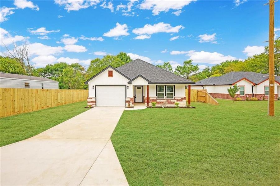 View of front of property featuring brick siding, roof with shingles, concrete driveway, covered porch, and an attached garage View of front of property featuring brick siding, roof with shingles, concrete driveway, covered porch, and an attached garage