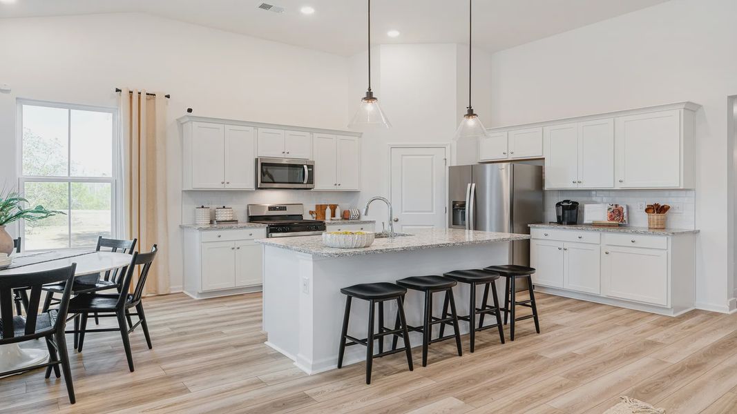 Furnished interior view inside a new home in Bluffs at Sun Colony, Longs (Image 6).