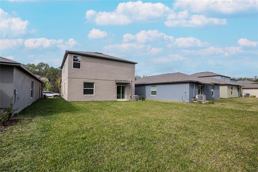 Exterior details and patio area of a home in Saddle Creek Preserve: The Manors II, Lakeland (Image 34).