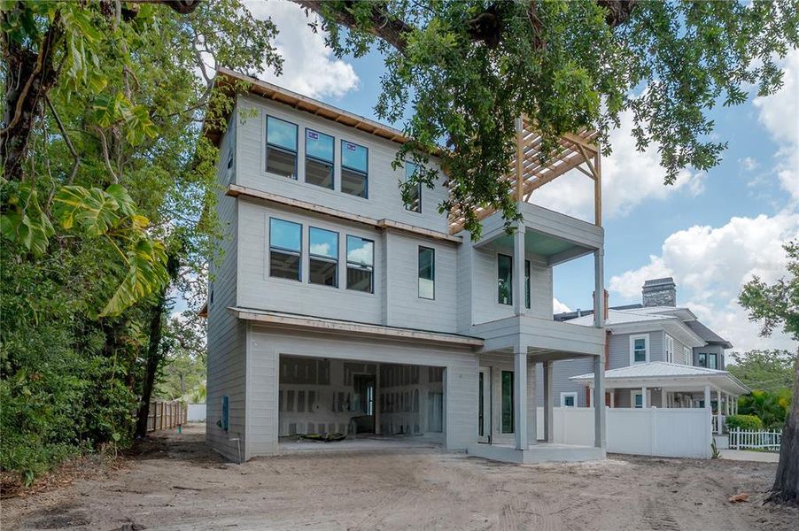 Front exterior of a new home in , Tampa, FL, highlighting curb appeal (Image 18). Front exterior of a new home in , Tampa, FL, highlighting curb appeal (Image 18).