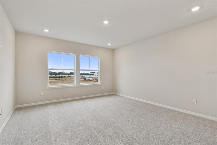 Spacious, unfurnished interior of a new home in Laureate Park at Lake Nona - Garden Series, Orlando (Image 35).