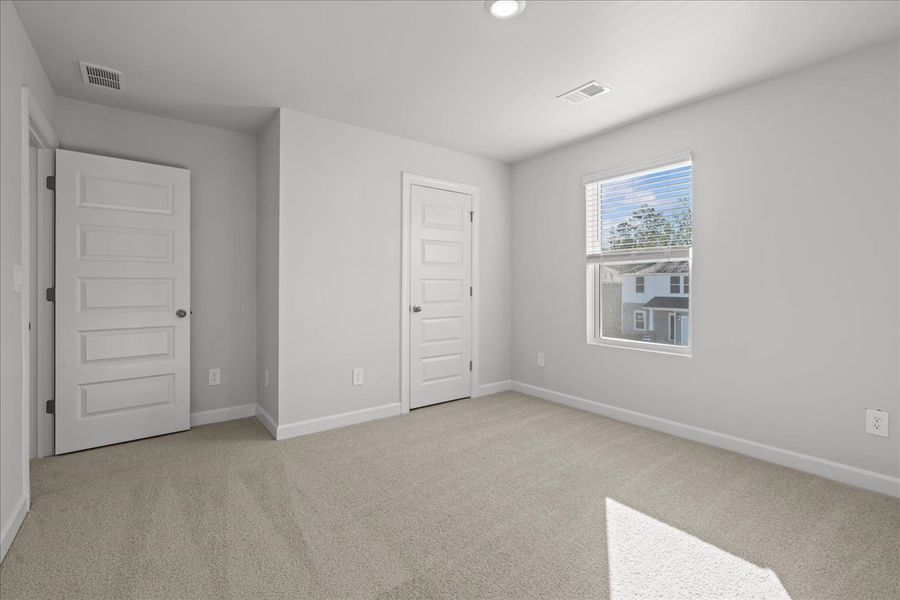 Spacious, unfurnished interior of a new home in Brayfield Manor - Signature Collection, Wellford (Image 24).