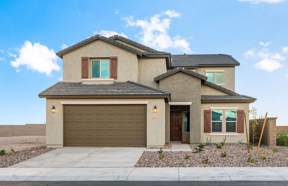 Front exterior of a new home in Parkside at Anthem at Merrill Ranch, Florence, AZ, highlighting curb appeal (Image 2).