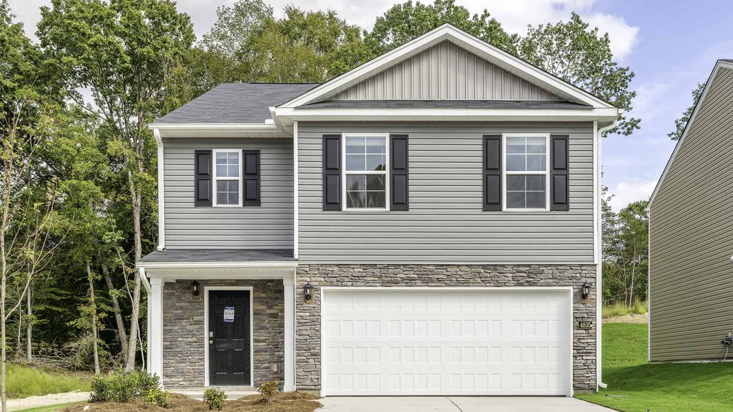 Front exterior of a new home in Chandler Pointe, Rural Hall, NC, highlighting curb appeal (Image 1).