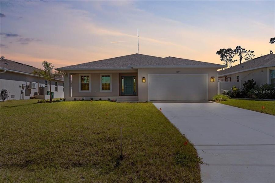 Front exterior of a new home in , Rotonda West, FL, highlighting curb appeal (Image 28). Front exterior of a new home in , Rotonda West, FL, highlighting curb appeal (Image 28).