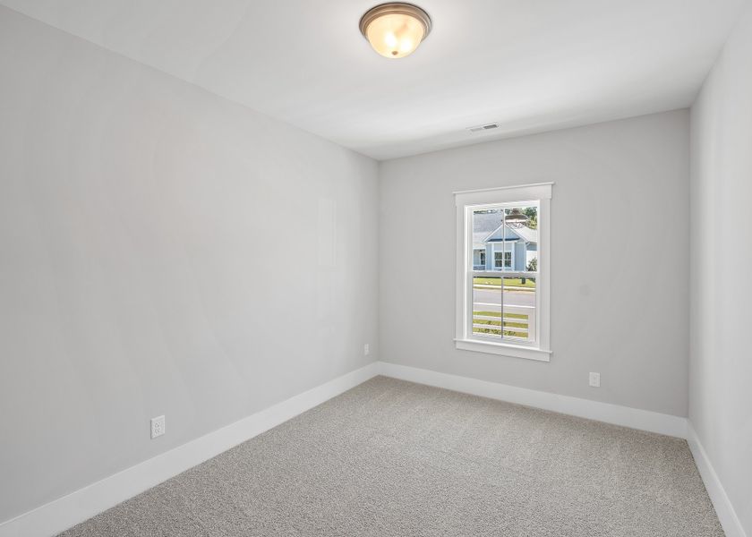 Representative unfurnished interior of a home built from the Birchwood by Bill Clark Homes in Osprey Landing, Southport (Image 25).