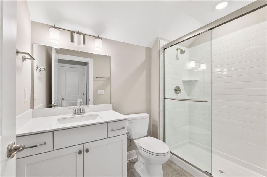 Furnished interior view inside a new home in The Courtyards at Bailey Farm, Dacula (Image 13).