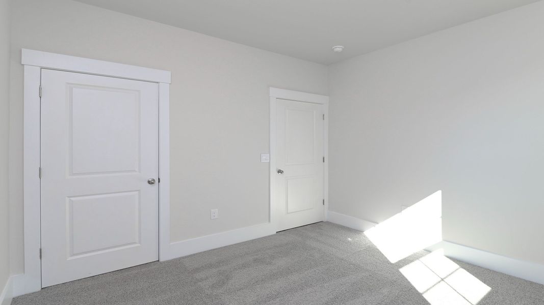 Spacious, unfurnished interior of a new home in Livingston Woods, Irmo (Image 32).