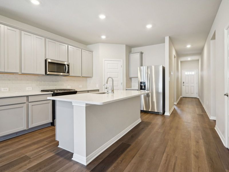 Furnished interior view inside a new home in Turner's Crossing - Reserve Collection, Buda (Image 3).