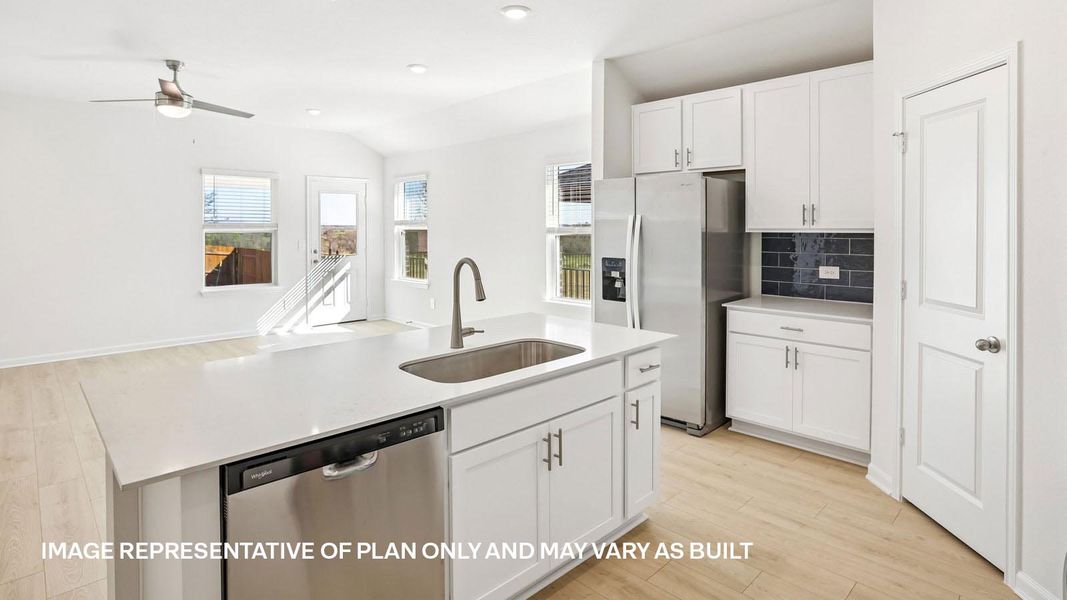 Representative furnished interior of a home built from the The Lakeway by D.R. Horton in Revelry, Del Valle (Image 11).