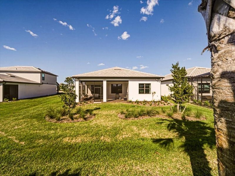 Exterior details and patio area of a home in Talon Preserve on Palmer Ranch, Nokomis (Image 39).