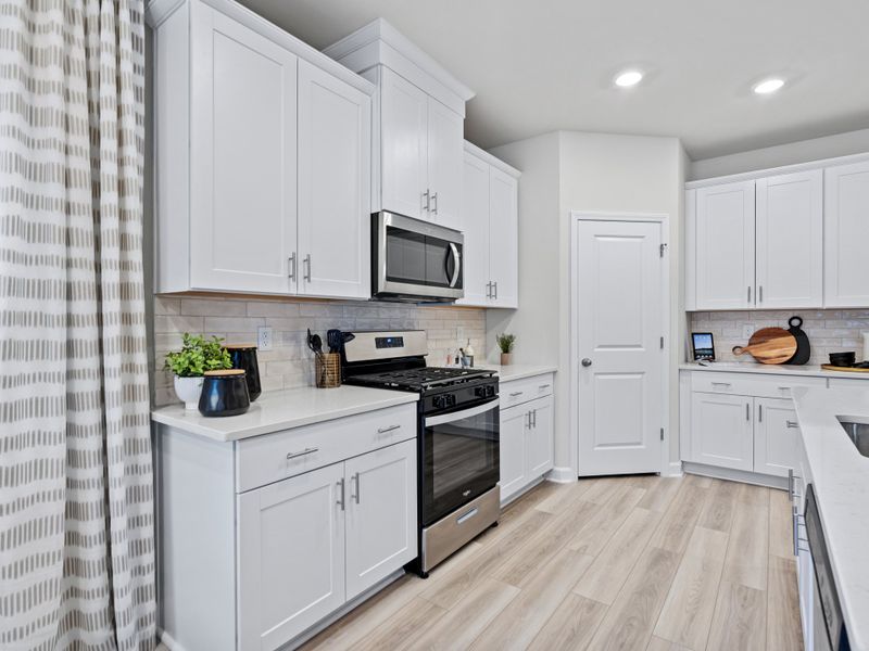 Furnished interior view inside a new home in Waterside - Coastline Series, Longs (Image 16).