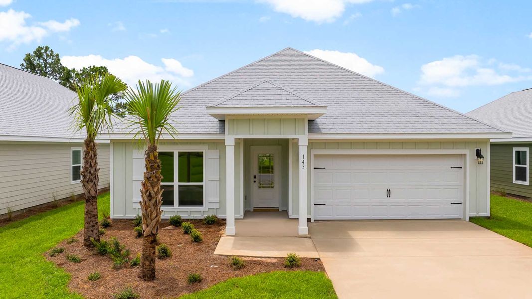 Front exterior of a new home in Bayside at Ward Creek, Panama City Beach, FL, highlighting curb appeal (Image 1). Front exterior of a new home in Bayside at Ward Creek, Panama City Beach, FL, highlighting curb appeal (Image 1).