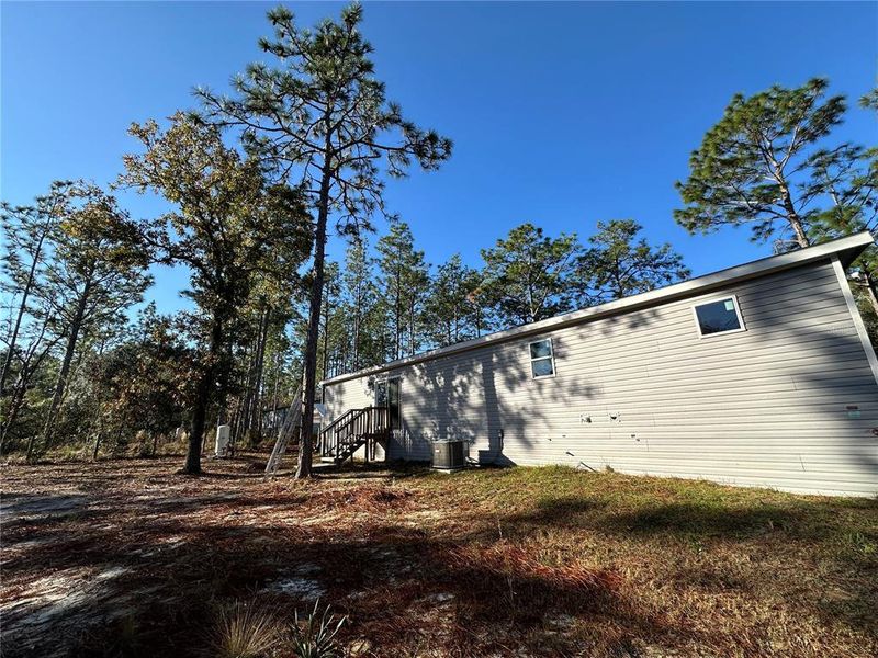 Exterior details and patio area of a home in , Williston (Image 22). Exterior details and patio area of a home in , Williston (Image 22).