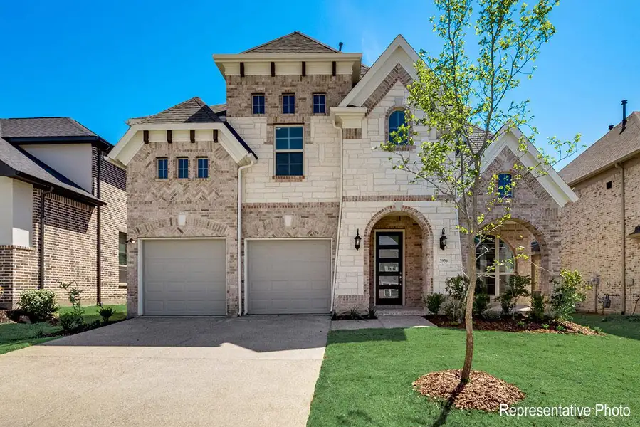 Representative exterior photo of a completed home built from the Alexandria II by Grand Homes in Grand Oaks, Celina, TX (Image 18).