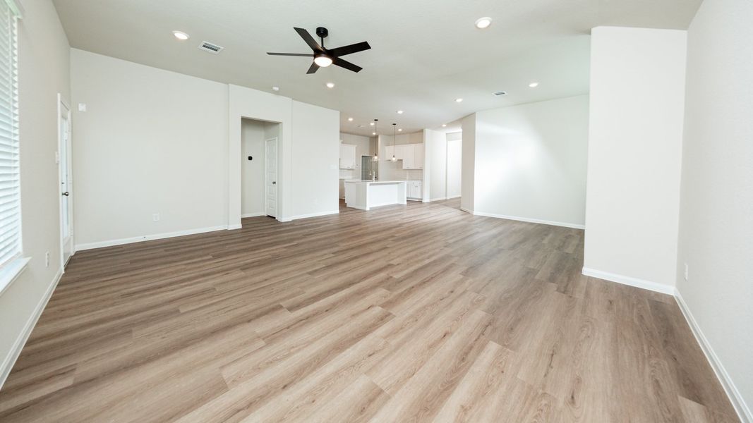 Family Room to Dining Area and Kitchen Family Room to Dining Area and Kitchen