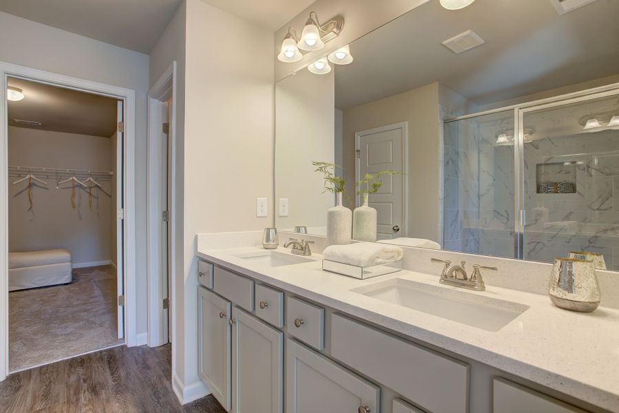 Primary bathroom with dual vanities