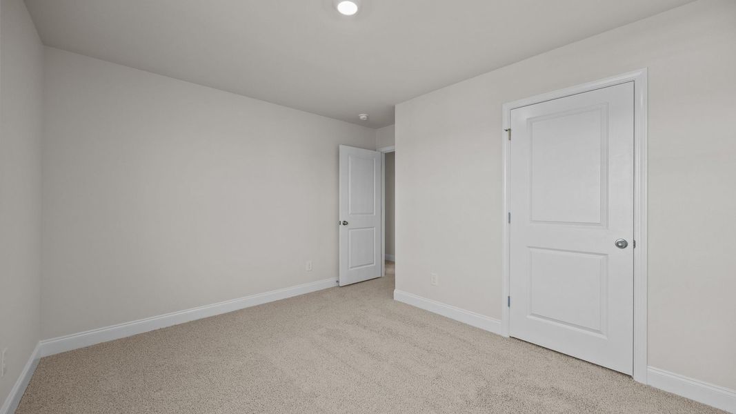 Spacious, unfurnished interior of a new home in Beaver Dam Crossing, Bailey (Image 32). Spacious, unfurnished interior of a new home in Beaver Dam Crossing, Bailey (Image 32).