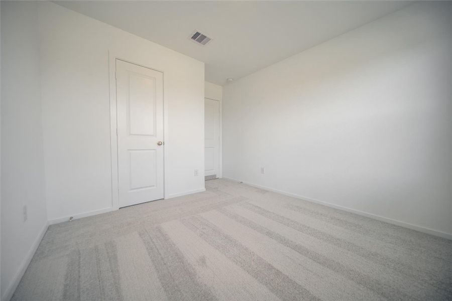 Spacious, unfurnished interior of a new home in Anniston: Watermill Collection, Katy (Image 10).