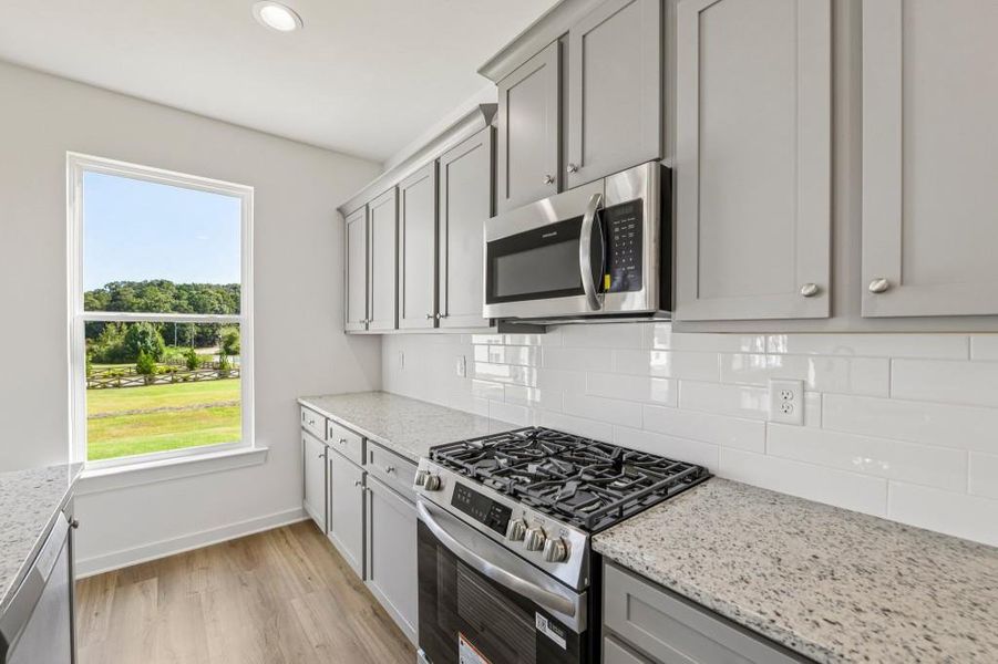 Furnished interior view inside a new home in Sutton’s Landing, Statham (Image 9).