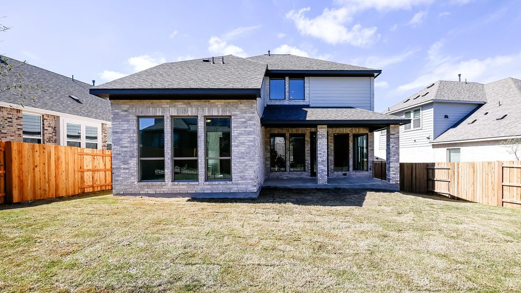 Exterior details and patio area of a home in 6 Creeks, Kyle (Image 3).