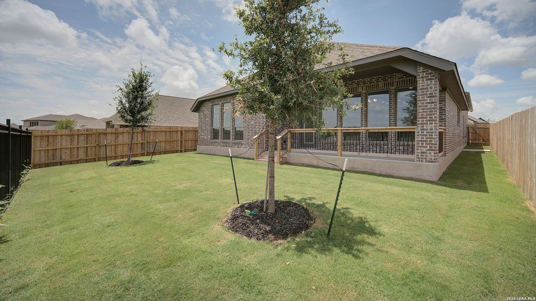 Exterior details and patio area of a home in Alsatian Oaks, Castroville (Image 24).