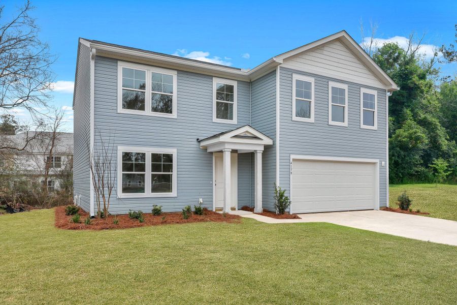 Front exterior of a new home in , Ladson, SC, highlighting curb appeal (Image 1). Front exterior of a new home in , Ladson, SC, highlighting curb appeal (Image 1).