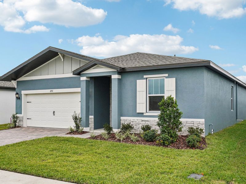 Front exterior of a new home in Two Rivers - Classic Series, Zephyrhills, FL, highlighting curb appeal (Image 15).