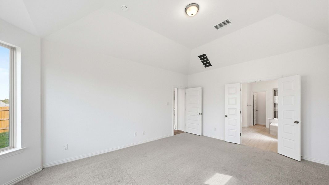 Furnished interior view inside a new home in Oaks at San Gabriel, Georgetown (Image 15).