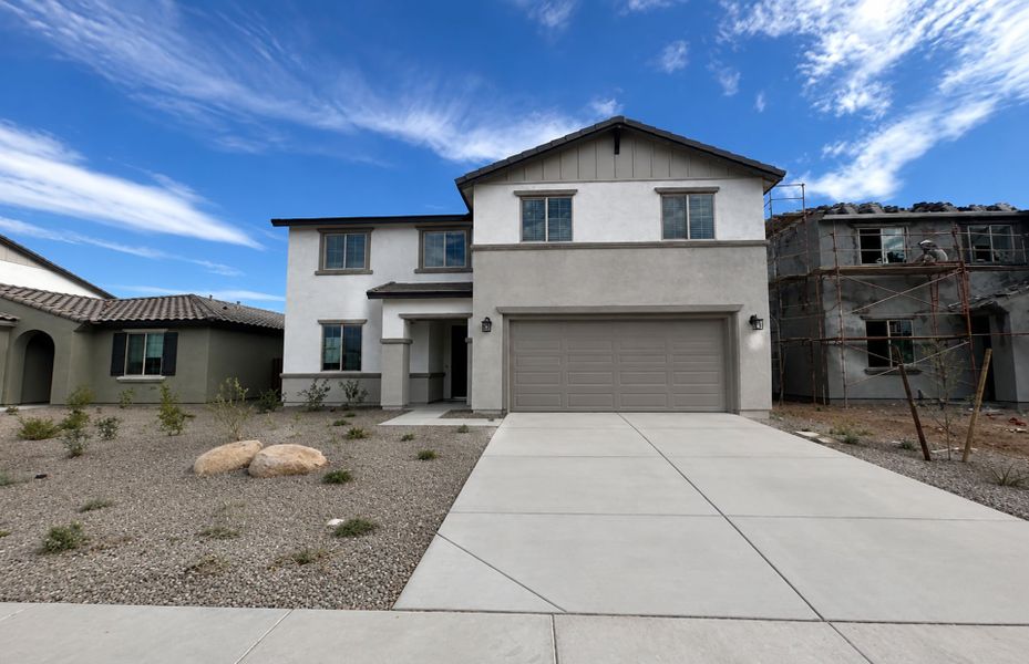 Front exterior of a new home in Alamar, Avondale, AZ, highlighting curb appeal (Image 1). Front exterior of a new home in Alamar, Avondale, AZ, highlighting curb appeal (Image 1).