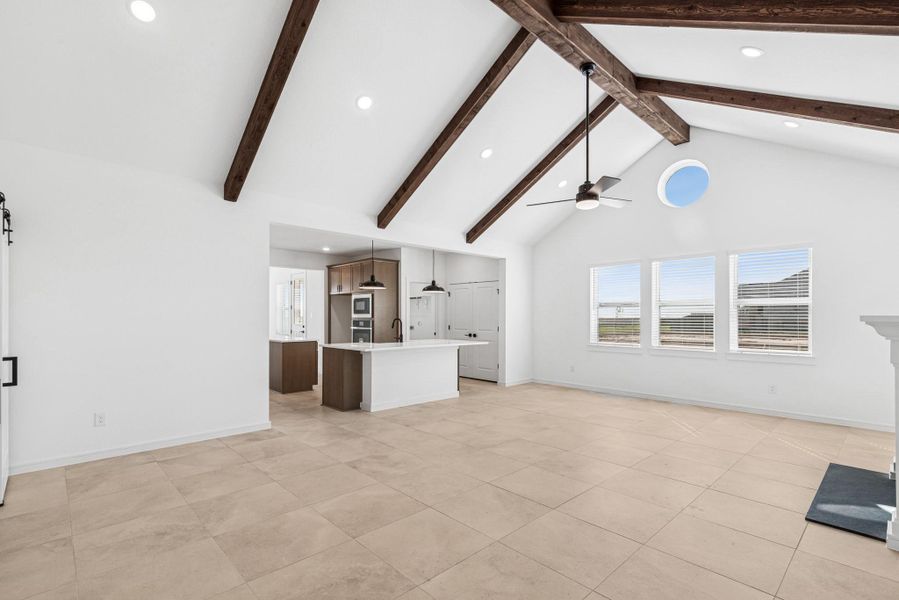 Relaxing great room with high vaulted ceilings (*Photo not of actual home and used for illustration purposes only.)