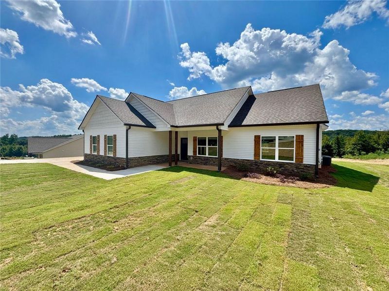 Front exterior of a new home in , Eastanollee, GA, highlighting curb appeal (Image 18). Front exterior of a new home in , Eastanollee, GA, highlighting curb appeal (Image 18).