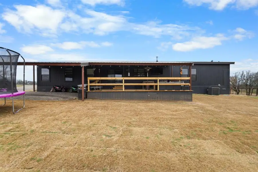 Front exterior of a new home in , Decatur, TX, highlighting curb appeal (Image 20). Front exterior of a new home in , Decatur, TX, highlighting curb appeal (Image 20).