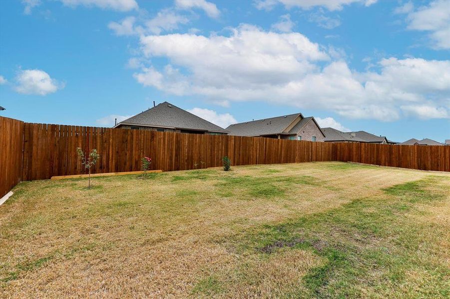 The covered patio and privacy fence allow for relaxing enjoyment of the backyard The covered patio and privacy fence allow for relaxing enjoyment of the backyard
