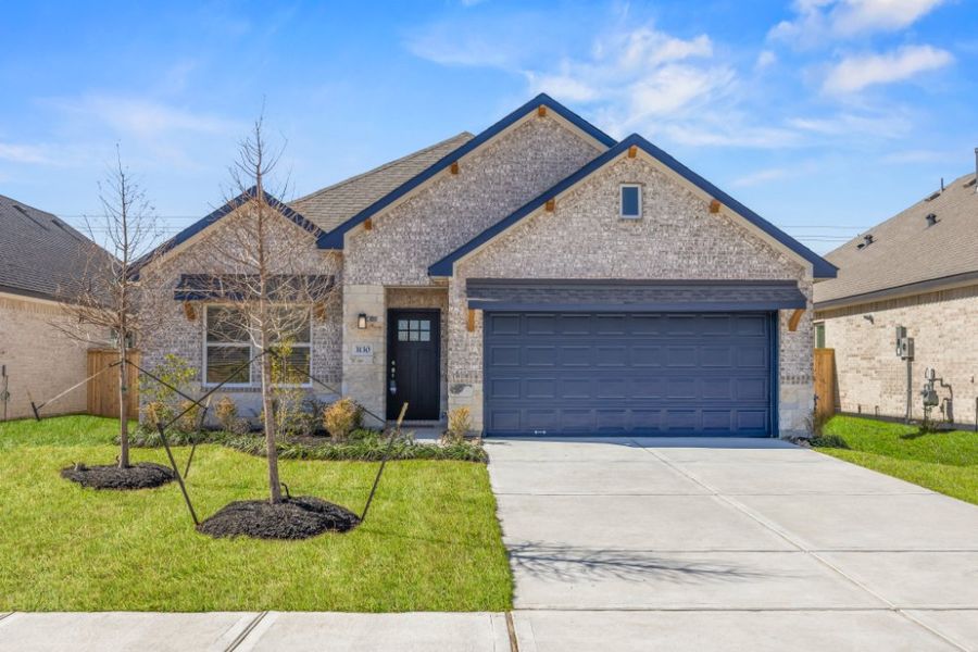 Front exterior of a new home in Ashland, Houston, TX, highlighting curb appeal (Image 16).