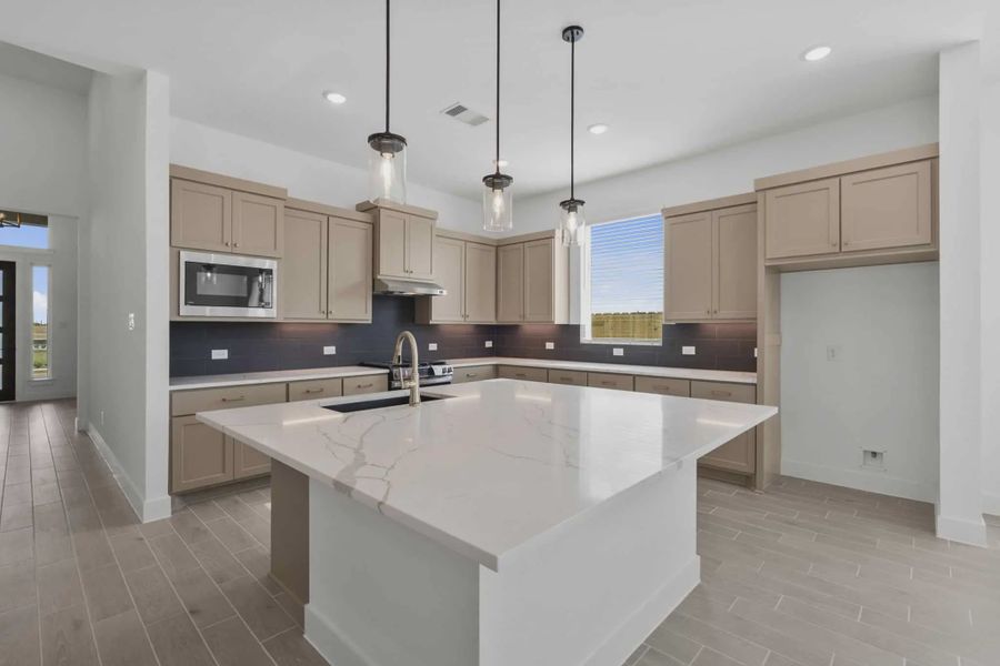 Representative furnished interior of a home built from the Nicklaus by Chesmar Homes in Riceland Alley Loads, Mont Belvieu (Image 10).