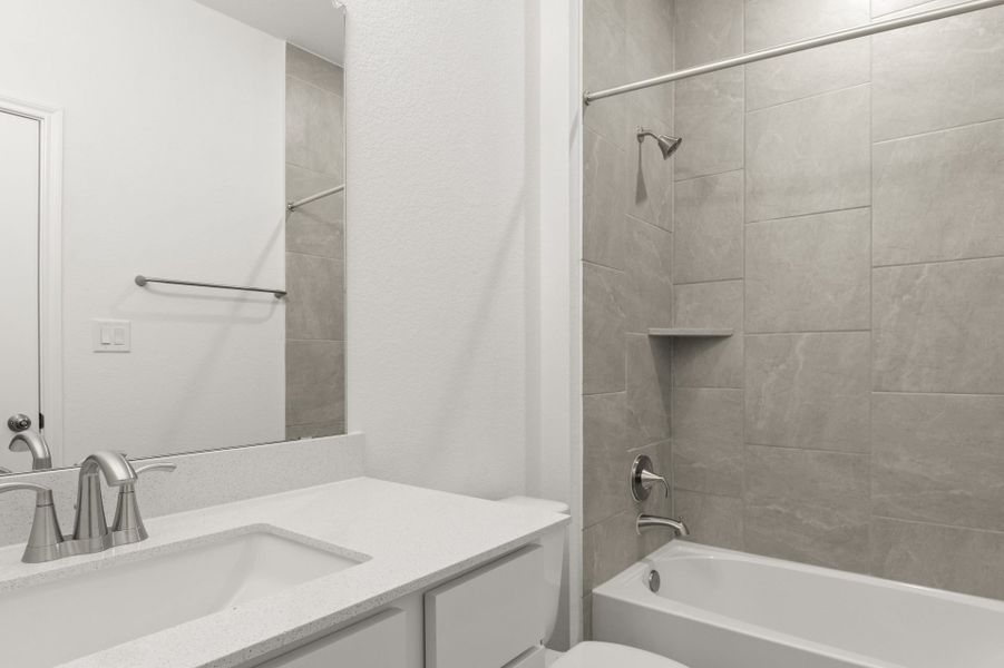 Furnished interior view inside a new home in Trace, San Marcos (Image 34).