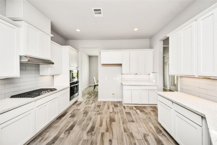 Furnished interior view inside a new home in Elm Estates, Angleton (Image 7).