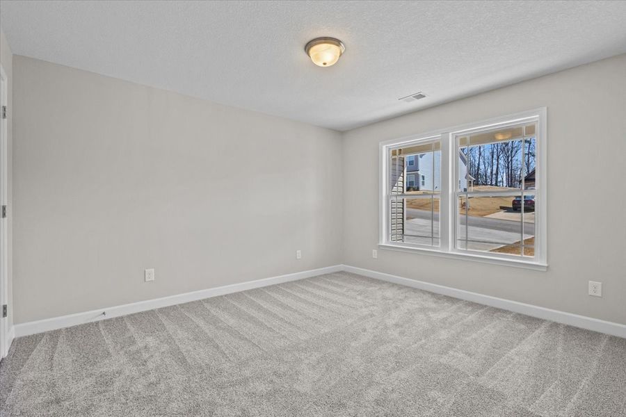 Representative unfurnished interior of a home built from the Brentwood by Enchanted Homes in Lonesome Dove, San Antonio (Image 13).