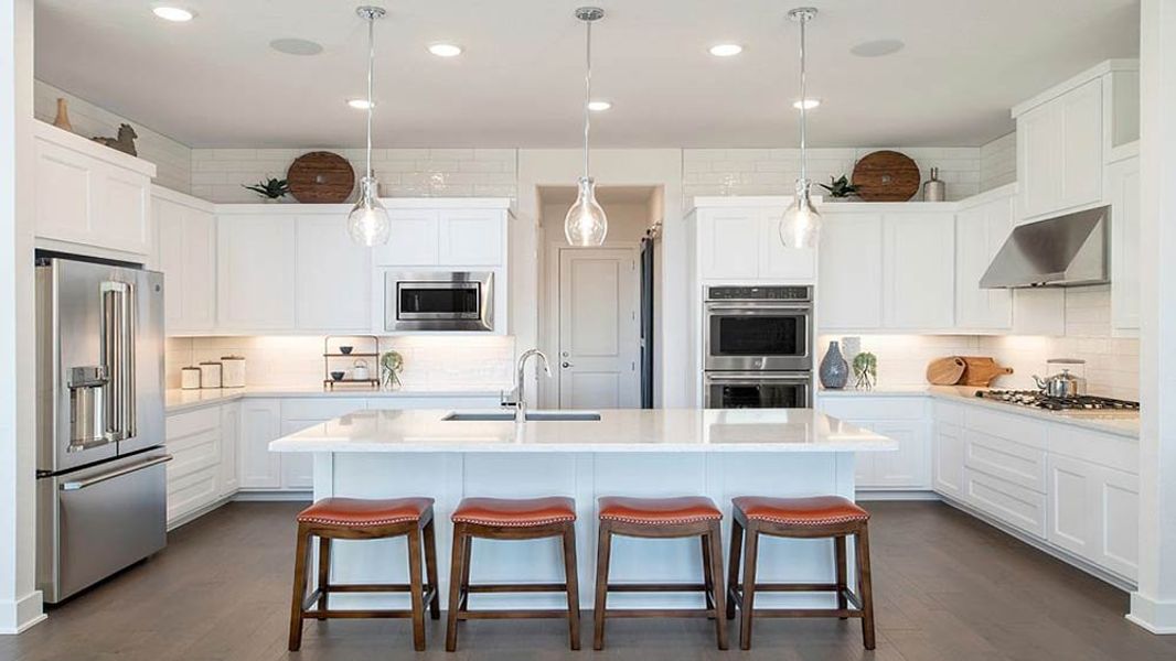 Representative furnished interior of a home built from the Palisade by Taylor Morrison in Travisso Naples Collection, Leander (Image 5). Representative furnished interior of a home built from the Palisade by Taylor Morrison in Travisso Naples Collection, Leander (Image 5).