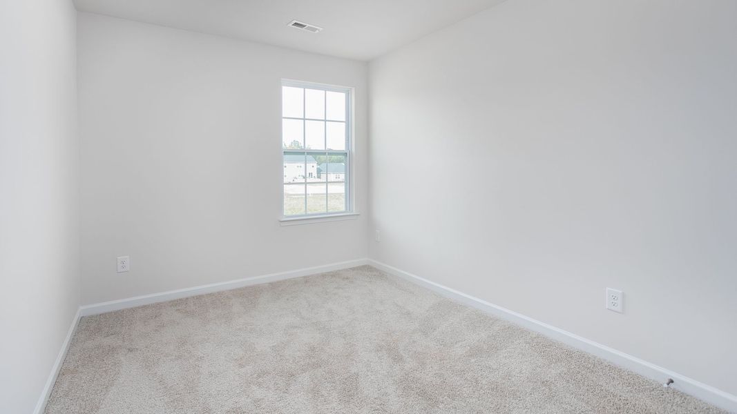 Representative unfurnished interior of a home built from the Maywood by D.R. Horton in The Townes at Riley's Meadow, Haw River (Image 8).