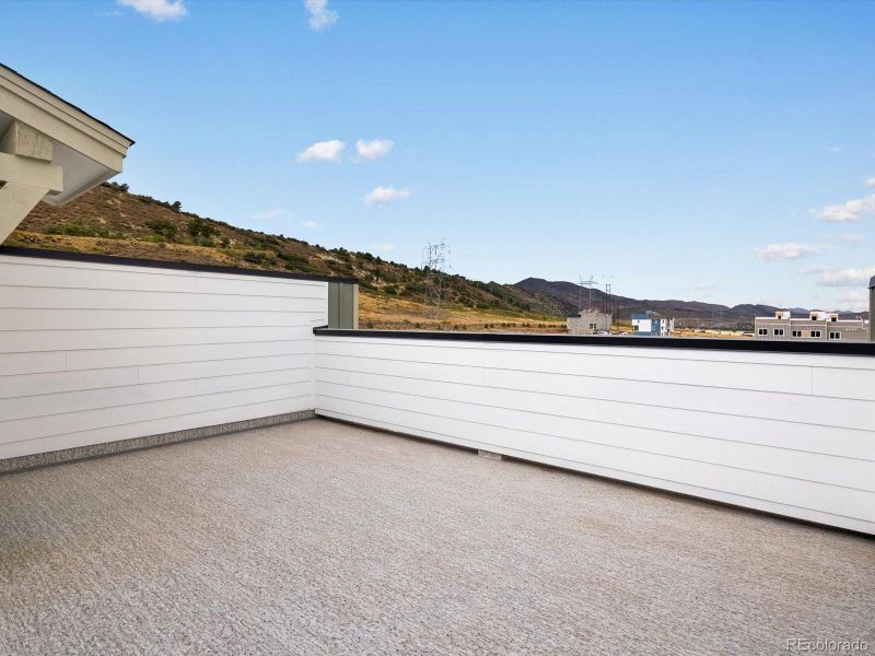 Front exterior of a new home in Three Hills, Morrison, CO, highlighting curb appeal (Image 22).