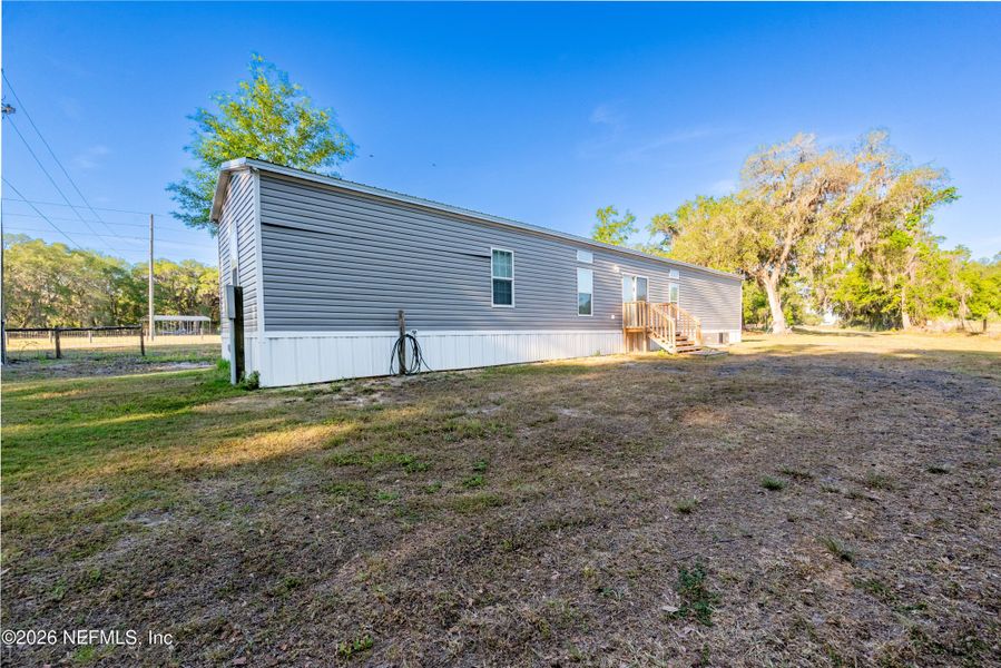 Exterior details and patio area of a home in , Gainesville (Image 19).