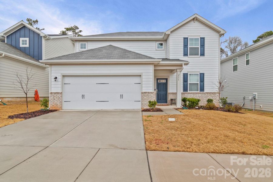 Front exterior of a new home in Blue Sky Meadows, Monroe, NC, highlighting curb appeal (Image 22).