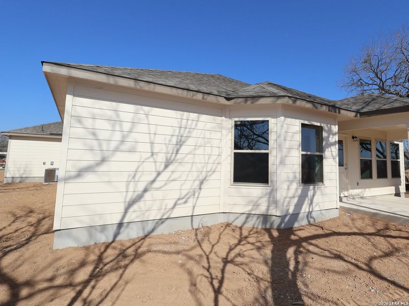 Exterior details and patio area of a home in Jordan's Ranch, San Antonio (Image 4). Exterior details and patio area of a home in Jordan's Ranch, San Antonio (Image 4).